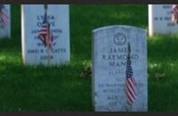 Gravestones at Arlington National Cemetery display U.S. flags on Memorial Day weekend.