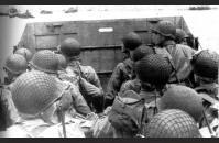 D-3) U.S. soldiers head toward the beach in an LCVP. US Army Signal Corps