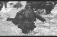 E-1) Robert Capa, photographer for Life magazine, went ashore at Omaha Beach with Company E, 16th Regiment, 1st Infantry Division