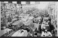 B-2) A Higgins Industries factory producing LCVPs. Eisenhower Center