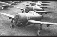 B-3) American fighter planes and bombers awaiting preflight servicing. Imperial War Museum, London